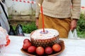 Easter cakes with a candle and colorful Easter eggs. without faces. Orthodox Easter, preparation for consecration with Holy water Royalty Free Stock Photo