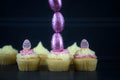 Easter cakes with chocolate eggs in a tall vertical line for creative decorations Royalty Free Stock Photo