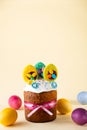 Easter cakes, painted eggs . Kulich is decorated with festive eggs icing, candied and meringues