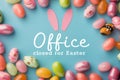 Easter candy background featuring bunny cutout and 'closed for easter' message over colorful eggs Royalty Free Stock Photo