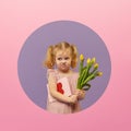 Easter card. Cute little child girl with bunny ears holding basket of Easter eggs. Child in a round hole circle in colored purple Royalty Free Stock Photo