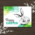 Easter card. Sketch watercolor Easter rabbit. Hand drawn illustration wooden background Royalty Free Stock Photo