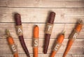 Easter carrots on a wooden background in rustic style