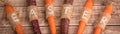 Easter carrots on a wooden background in rustic style