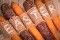 Easter carrots on a wooden background in rustic style