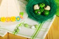 Easter cheese dessert, Easter eggs and candy in cotton towel. Ba