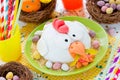 Easter chicken fondant cake on festive decorated table Royalty Free Stock Photo