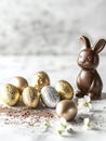 Easter Chocolate Eggs and Bunny on a Marble Surface Royalty Free Stock Photo