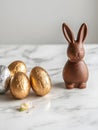 Easter Chocolate Eggs and Bunny on a Marble Surface Royalty Free Stock Photo
