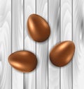 Easter chocolate three eggs on grey wooden background