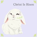 Easter. Christ Is Risen. An Easter gray rabbit holds a green blade of grass on a light background with the inscription Royalty Free Stock Photo