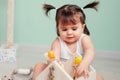 Easter close up indoor portrait of cute happy baby girl Royalty Free Stock Photo