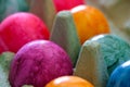 Easter colored eggs in a cardboard box Royalty Free Stock Photo