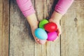 Easter colored krashenki on a wooden background.