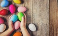 Easter colored krashenki on a wooden background.