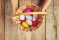 Easter colored krashenki on a wooden background.