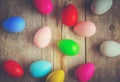 Easter colored krashenki on a wooden background.