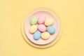 Easter colored pastel eggs on the plate, holiday card Royalty Free Stock Photo