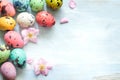 Easter colorful eggs and cherry blossom background blue Royalty Free Stock Photo
