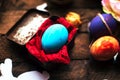Easter Composition with chicken Eggs on the Warm Wooden Background. Easter composition with fresh eggs. Chicken egg in the nest. C Royalty Free Stock Photo