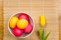 Easter composition, colorful eggs in ceramic bowl