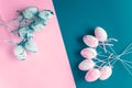 Easter composition. Decorative eggs are laid out on a two-tone pink and blue background. copy space Royalty Free Stock Photo