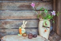 Easter composition of Easter eggs, a wriggle hazel with rabbit, Royalty Free Stock Photo