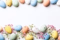 Easter composition of Easter quail eggs and flowers Royalty Free Stock Photo