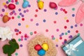 Easter composition eggs bunny confetti box with gift on a pink background. Flat lay, top view, copy space Royalty Free Stock Photo