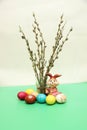 Easter composition with eggs, willow and rabbit