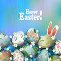 Easter composition of a light rainbow shade with magnificent eggs, flowers, grass and rabbit ears