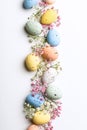 Easter composition of Easter quail eggs and flowers Royalty Free Stock Photo