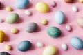 Easter composition. Stylish eggs flat lay on pink background. Modern natural dyed colorful easter eggs layout in sunny light and