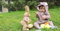 One year baby boy playing on the grass in rabbit suit Royalty Free Stock Photo