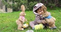 One year baby boy playing on the grass in rabbit suit Royalty Free Stock Photo