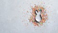 Easter Concept, Sugar Sprinkles and Cookie Cutter on Grey Background Royalty Free Stock Photo