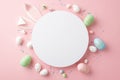 Top view photo of white circle easter bunny ears green blue pink eggs and sprinkles on isolated pastel pink background