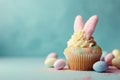 Easter cupcake with bunny ears and frosting