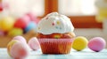 Easter cupcake and easter eggs on table, closeup