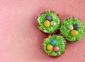 Easter cupcakes with malted chocolate eggs Royalty Free Stock Photo