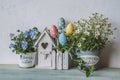 Easter decor with bird house and spring flowers Royalty Free Stock Photo