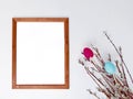 Easter decor with blank frame mockup on white