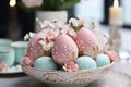 Easter decor with painted pink and mint eggs and flowers Royalty Free Stock Photo
