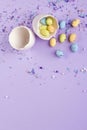 Easter decor in pastel colors. Easter eggs, candy, sweets, flowers and eggshells. Royalty Free Stock Photo