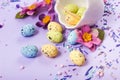 Easter decor in pastel colors. Easter eggs, candy, sweets, flowers and eggshells. Royalty Free Stock Photo