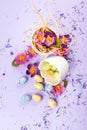 Easter decor in pastel colors. Easter eggs, candy, sweets, flowers and eggshells. Royalty Free Stock Photo