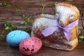 Easter lamb cake with purple ribbon, easter eggs and willow sticks Royalty Free Stock Photo