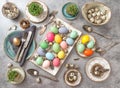 Easter decoration. Festive table setting colored eggs