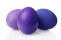 Easter decoration, three chicken eggs painted in purple color