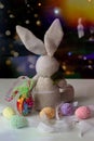 Easter decoration with toy bunny, painted eggs Royalty Free Stock Photo